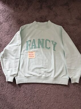 Fancy d boutique Mockneck so cute love just accidentally bought 2 
Size XS/S